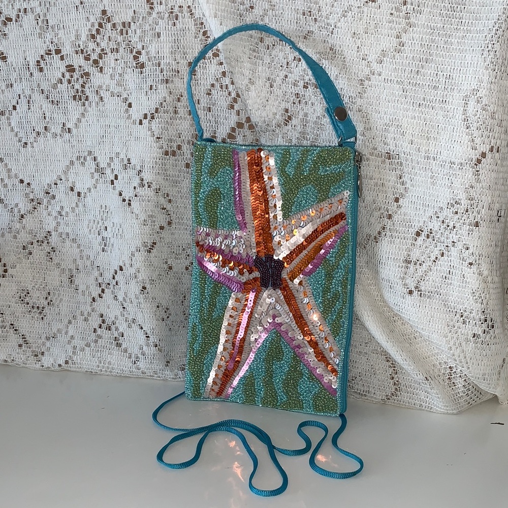 Bamboo Trading Club Bag crossbody with a sequence Starfish design